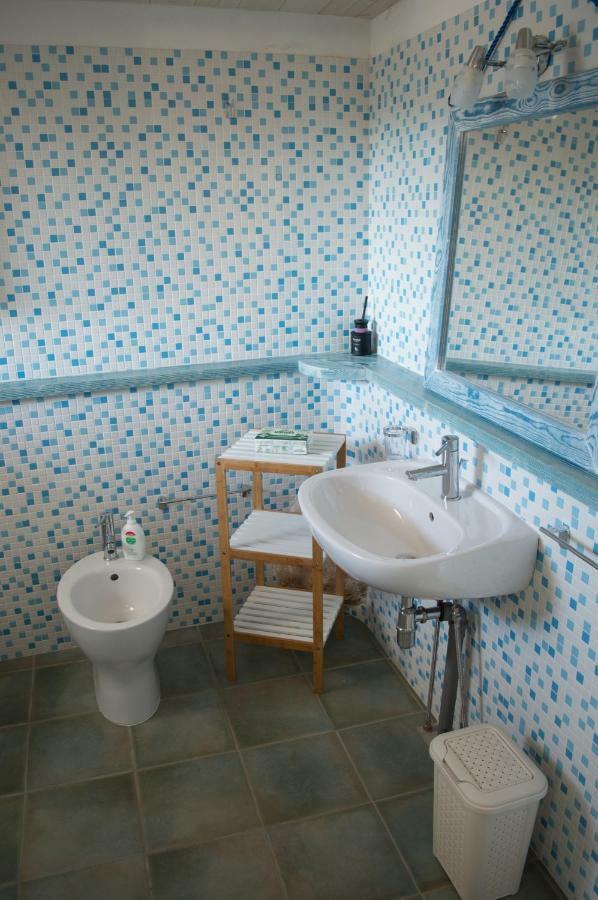 Nel Verde Del Villaggio - Casetta Celeste Гоннеза Экстерьер фото